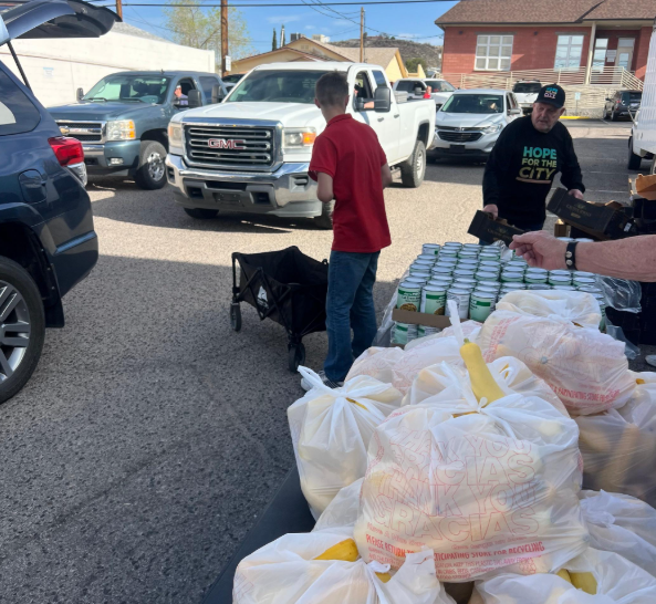 Community members receiving food supplies