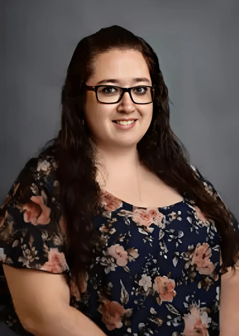 Smiling woman with long dark hair