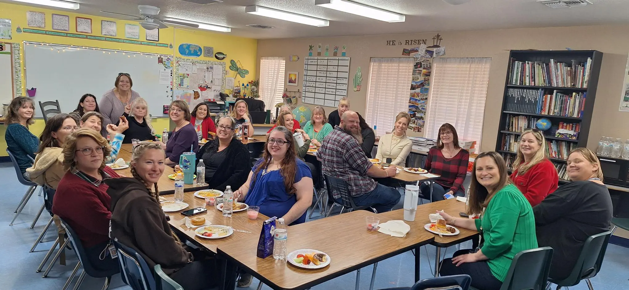 Group of people sitting in a classroom.